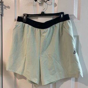 Mint adidas 6” running shorts with side zipper pockets